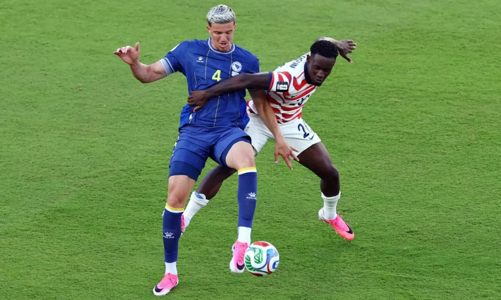 United States forward Folarin Balogun celebrates his goal during the FIFA World Cup match against Bosnia and Herzegovina.