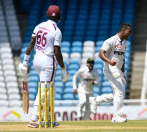 Pakistan players celebrate after taking a wicket against the West Indies during the first Test at the Brian Lara Stadium.
