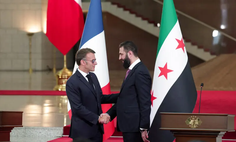 French President Emmanuel Macron and Syrian President Ahmed al-Sharaa hold talks in Damascus as security forces respond to nearby explosions.