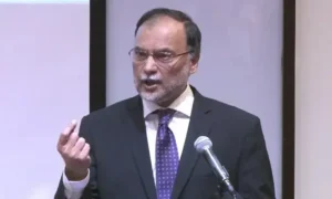 Federal Minister Ahsan Iqbal speaks at the LCCI IT Freelancing Awards 2026, announcing China's digital skills training programme for Pakistani youth.