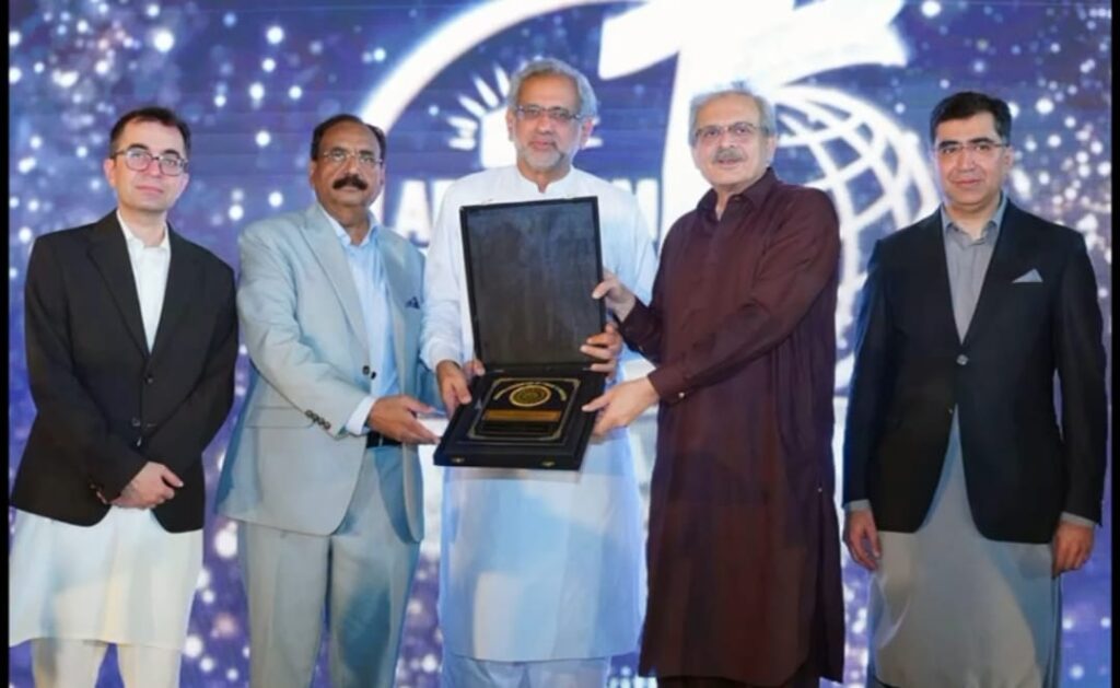 Shahid Khaqan Abbasi speaking at an Al Khair Hajj Group ceremony in Karachi on Pakistan's economy and exports.