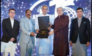 Shahid Khaqan Abbasi speaking at an Al Khair Hajj Group ceremony in Karachi on Pakistan's economy and exports.