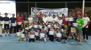 Aqeel Khan coaches male and female players during the Sindh Sports Gala tennis coaching camp at Falcon Sports Complex in Karachi.