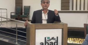 SBCA Director General Dr Wasim Shamshad and ABAD Chairman Muhammad Hassan Bakhshi discuss digital reforms and building approvals at ABAD House in Karachi.