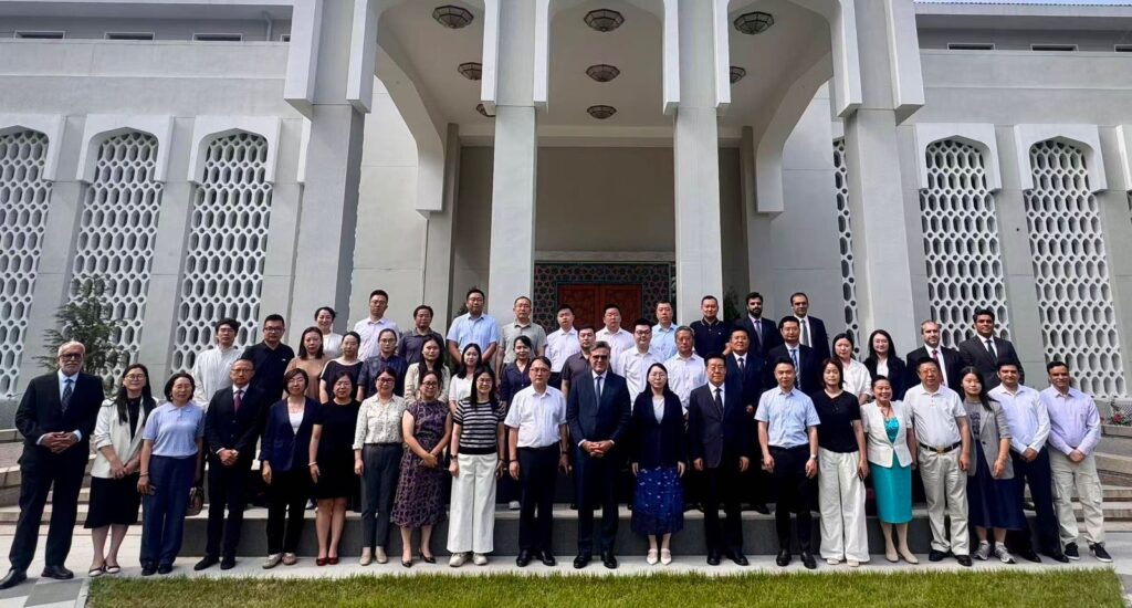 Participants attend the TVET Symposium at the Pakistan Embassy in Beijing focused on pharmaceuticals, healthcare, and biotechnology cooperation.