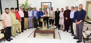 Dr Zahid Hasan Ansari hosting a business dinner in Karachi attended by FPCCI leaders and industrialists.