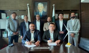 Officials from K-Solar and Ming Yang signing a renewable energy Memorandum of Understanding in Karachi.
