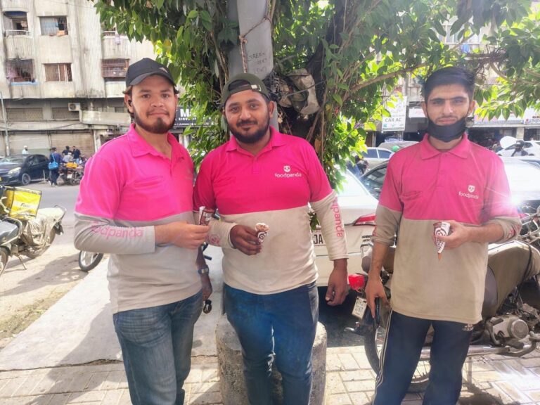 foodpanda delivery riders use rest stations and hydration facilities during the company's nationwide summer heat relief initiative.