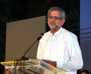 Shahid Khaqan Abbasi speaking at an Al Khair Hajj Group ceremony in Karachi on Pakistan's economy and exports.