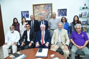 Mike McGovern and members of the Pakistan National PolioPlus Committee during a meeting in Karachi.