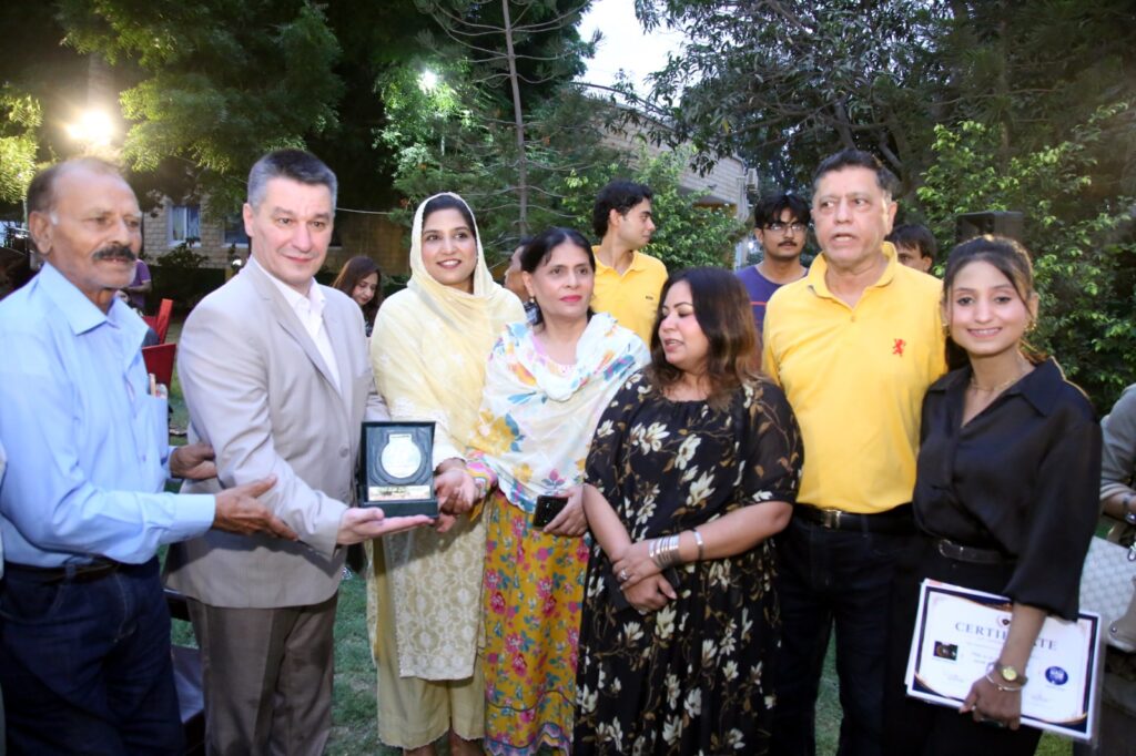 Journalists, social media activists, public figures and guests gather at the All Pakistan Media Alliance's awards ceremony and mango party held in collaboration with the Russian Centre for Science and Culture in Karachi.