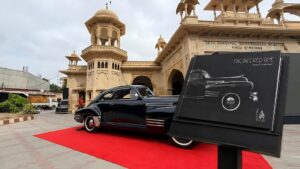 Classic and antique cars displayed during the launch of the Engineered Time photography book at the National Academy of Performing Arts in Karachi.