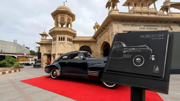 Classic and antique cars displayed during the launch of the Engineered Time photography book at the National Academy of Performing Arts in Karachi.