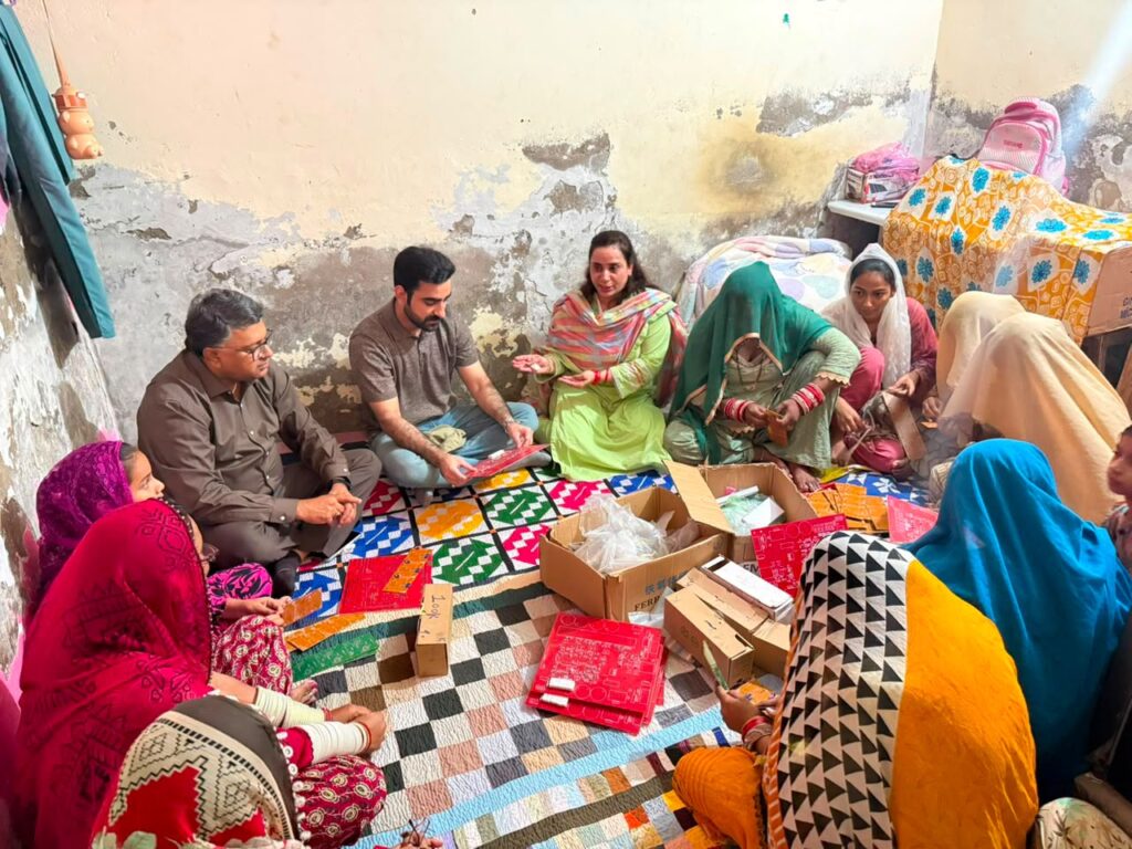Women manufacturing solar inverters at a PPRP-supported enterprise in Ghotki, Sindh.