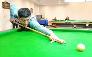 Punjab's Mubashir Raza competes against former world champion Muhammad Asif during the Ali Asghar Valika Snooker Championship at Naya Nazimabad, Karachi.
