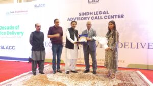 Sindh Home and Law Minister Zia-ul-Hassan Lanjar speaks at a Legal Aid Society ceremony focused on human rights and legal aid in Karachi.