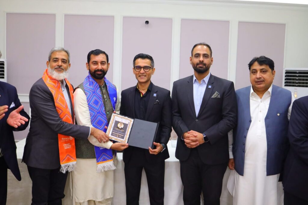 Rotary District 3271 Governor Shahzad Sabir with members at the Joint Installation Ceremony of Karachi Rotary clubs.