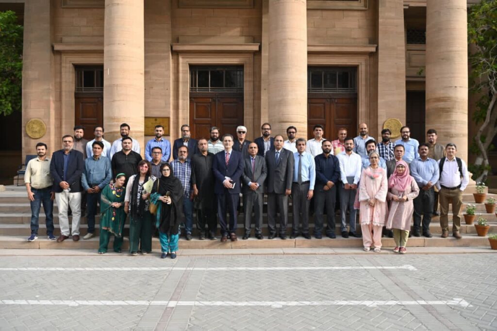 State Bank of Pakistan officials address journalists during a briefing on the Prime Minister's Housing Loan Scheme, explaining eligibility, financing and application procedures.