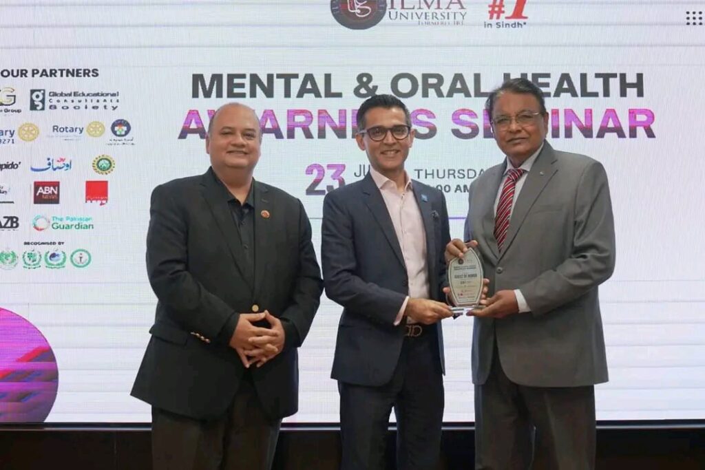 Healthcare professionals and Rotary leaders conduct a Mental Health and Oral Health Awareness Session for students at ILMA University in Karachi.