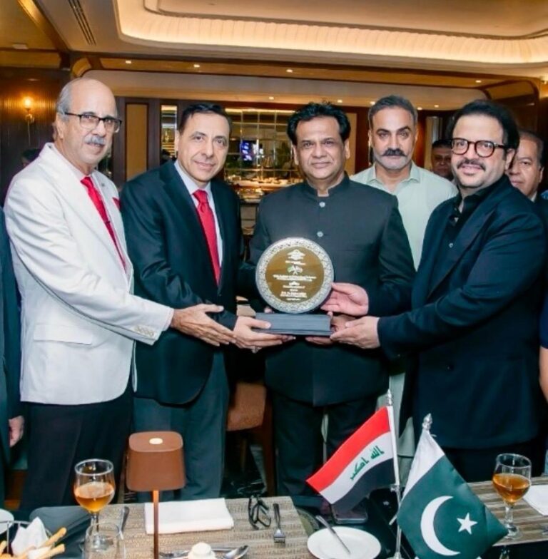 Kafeel Hussain presents a commemorative shield to Iraq’s Consul General at a diplomatic farewell reception hosted by KHA Business & International Relations.