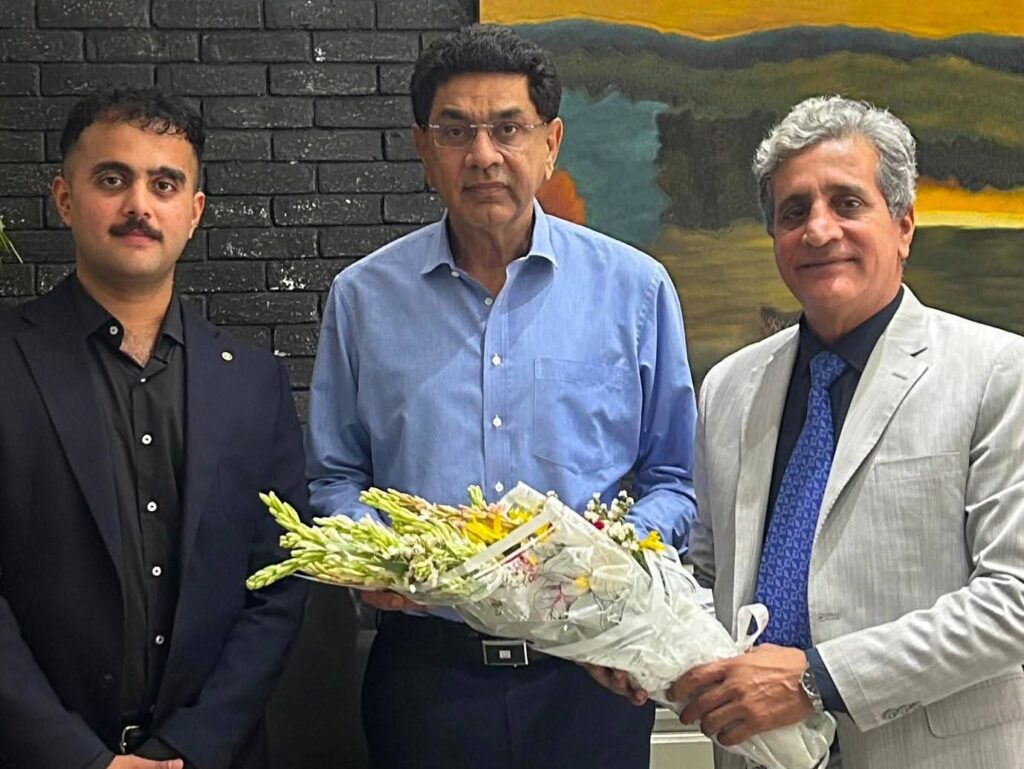 Sardar Sajjad and Saadullah Sajjad presenting birthday wishes to Salim Habib Godil, CEO and Managing Director of Toyota Central Motors.