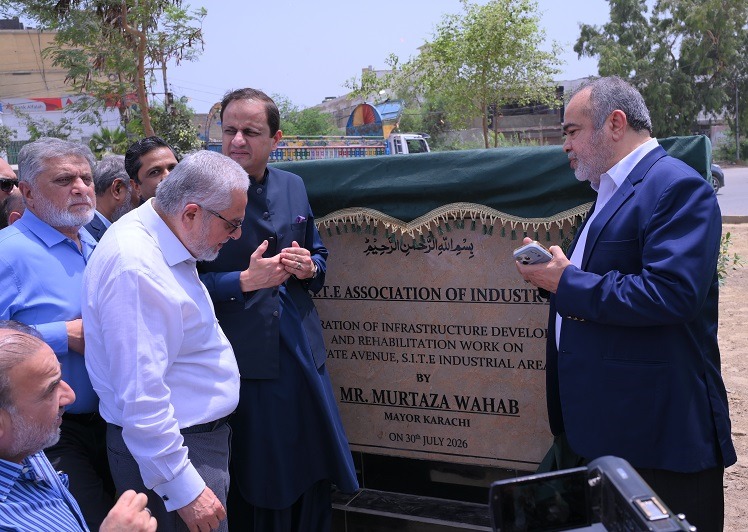 Mayor Murtaza Wahab unveils the foundation stone for the SITE infrastructure development project in Karachi.
