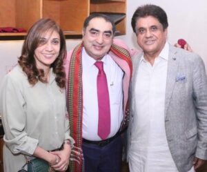 Rotary leaders, literary personalities and guests pose together during a celebratory luncheon in Karachi.