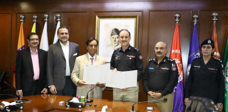 Karachi Police Additional IG Azad Khan and PEBS President Qazi Sajid Ali signing a memorandum of understanding at KPO.