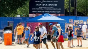People gather near the National Mall during a severe US heatwave that disrupted Independence Day celebrations.