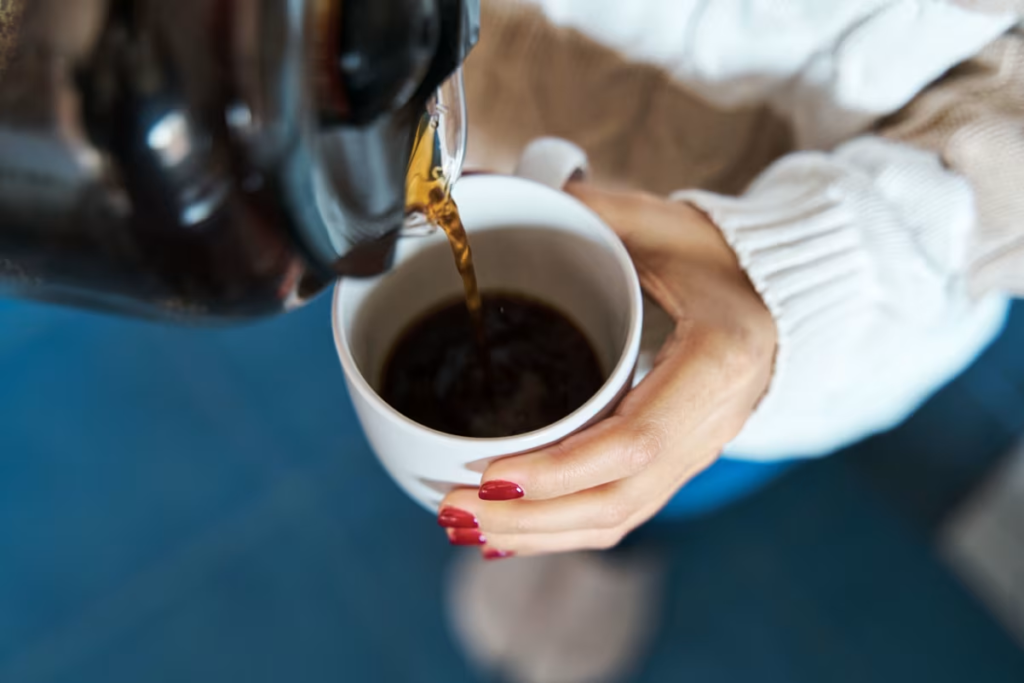 Cup of black coffee representing research on coffee benefits for liver disease and liver cancer prevention.