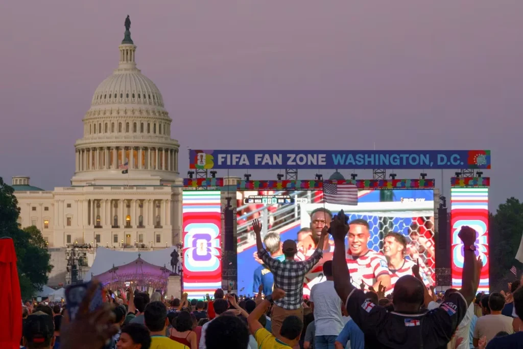 Football fans celebrating during the FIFA World Cup across the United States.