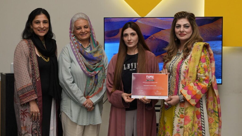 Representatives of SAWDF Pakistan and partner organizations celebrate the successful completion of the first year of the FAME Program focused on women's economic empowerment.