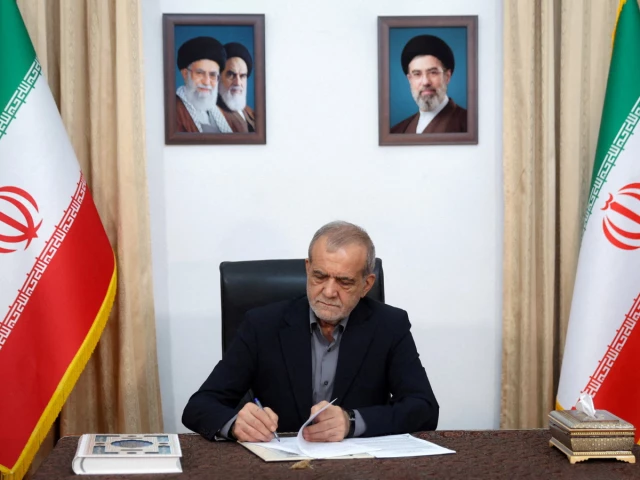 Iranian President Masoud Pezeshkian speaks during a public address as military tensions between Iran and the United States intensify.