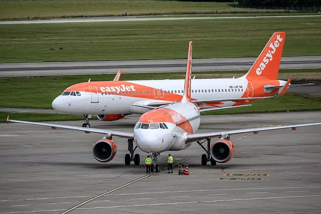 An EasyJet passenger aircraft on the runway following the airline's announcement of a proposed takeover agreement with US investment firm Castlelake.