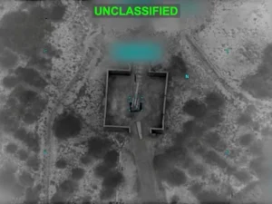 Military activity near the Strait of Hormuz as the US and Iran exchange attacks.