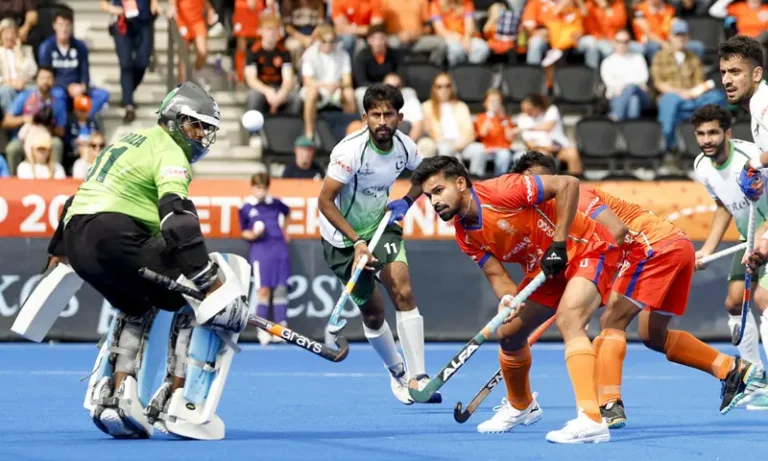 India and Pakistan players compete during the Hockey World Cup match in Amstelveen