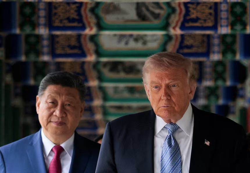 Chinese and US national flags symbolising growing trade and diplomatic tensions.