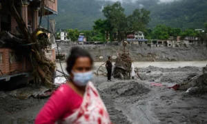 Rescue workers search for missing people after the deadly Nepal flood disaster.