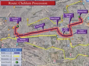 Traffic police personnel directing vehicles during Karachi traffic diversions for the Chehlum procession.