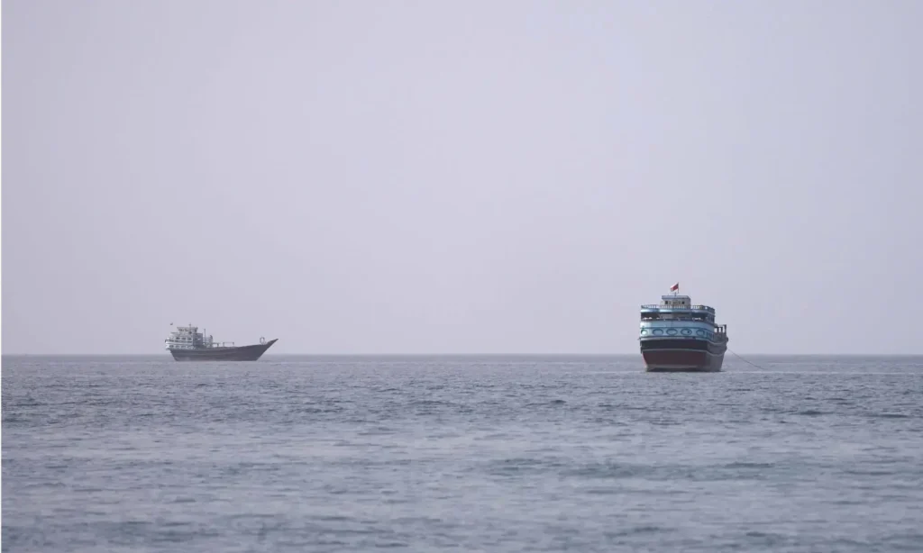 Ships sailing through the Strait of Hormuz amid Iran-Oman maritime negotiations