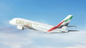 Emirates aircraft at airport as airline introduces free Dubai date changes and lower refund fees