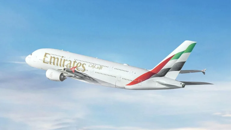Emirates aircraft at airport as airline introduces free Dubai date changes and lower refund fees
