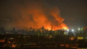 Rescue workers search damaged buildings following Russia's missile and drone attack on Kyiv.