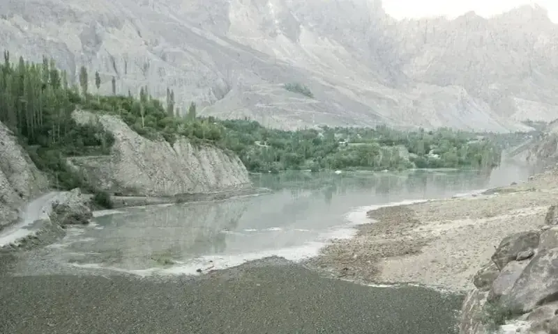 Floodwaters sweep through a village in Gilgit-Baltistan after cloudbursts and glacial melting