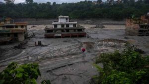 Rescue workers search for survivors after the devastating Nepal flood