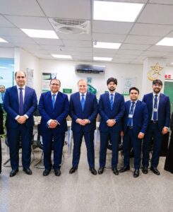 Group Head Syed Muhammad Talib Rizvi and Zonal Head Tahir Qureshi visit a Bank AL Habib branch to meet employees.