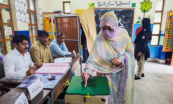 Men and women participate in polling during the second phase of AJK Elections in Muzaffarabad Division.
