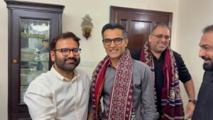 Barrister Hallar Wassan with Karachi business leaders at a dinner meeting discussing investment and economic development.