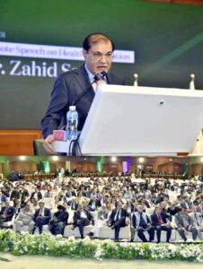 Business leader Mian Zahid Hussain speaking at the Pakistan Economic Summit at the Jinnah Convention Centre in Islamabad.