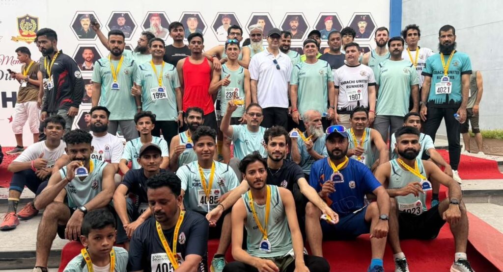 Karachi United Runners Club members compete in the Sindh Police Martyrs Morning Run while paying tribute to fallen police personnel.